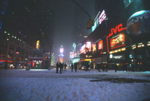 Times Square: lit, snowed in