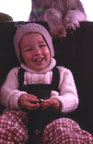 Sam having a smile in the backseat of the VW Bus