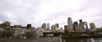 Seattle from the piers: QFD US Tower is on the far left with flag pole