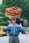 Turkish lad balancing breakfast, Istanbul, Turkey