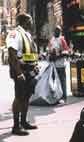 Times Square police guy keeping an eye on hawkers